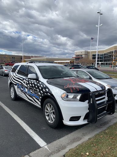 Officer Boivie’s patrol car outside MHS. 
