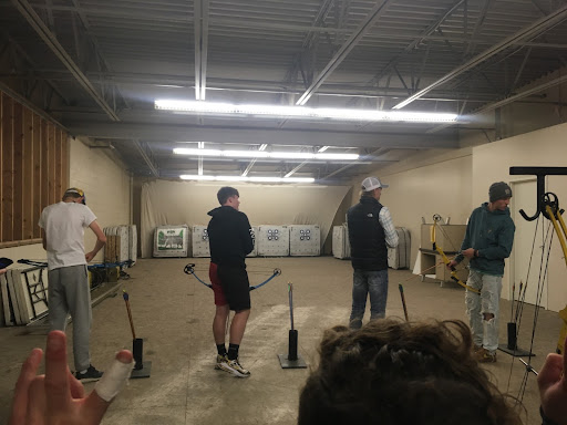 Students getting ready for the competition, the archery range is above the AG building.

