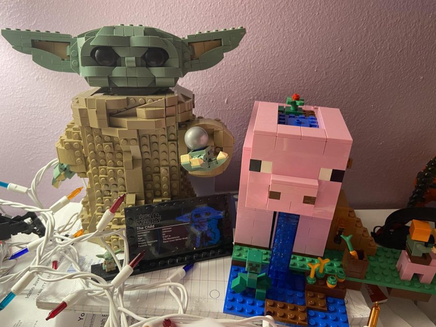 Senior Hannah Burrells Lego projects she has completed. One being a Baby Yoda statue, and the other being a big Minecraft pig. 