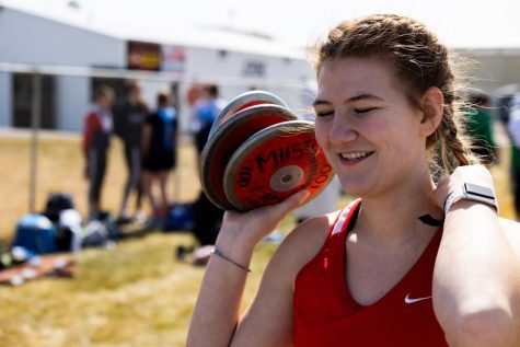 Camryn Stanford prepares to throw at a track meet in Jerome.