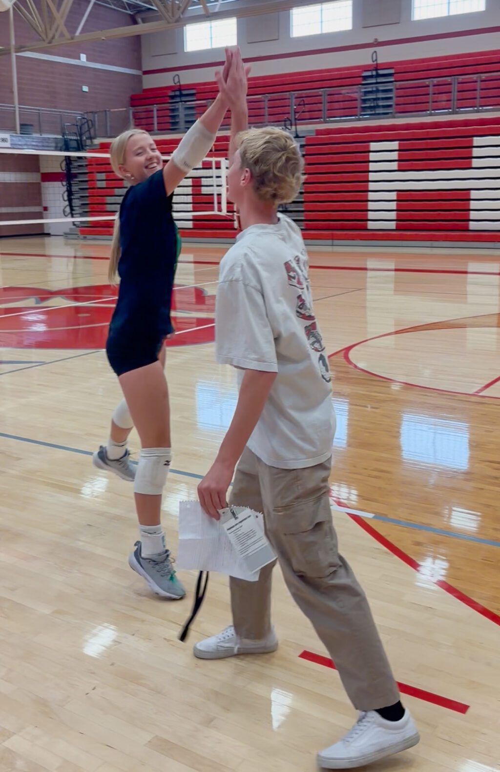 Parker Willmore at least gets a high five with a volleyball player after trying a pick up line